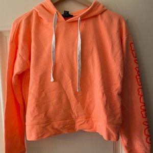 bright coral cropped hoodie